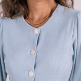 ELEVATE BLOUSE SKY BLUE